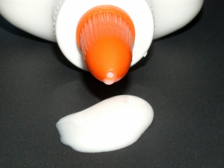 Why Does Glue Not Stick to the Inside of a Bottle?