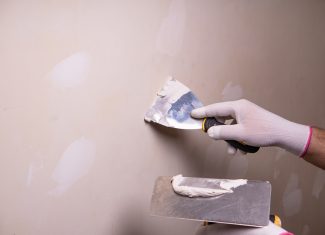 How To Spackle Drywall Holes Like A Pro